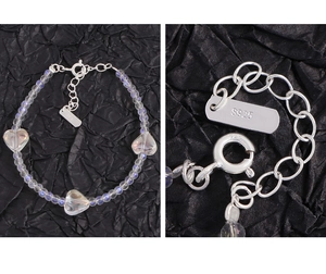Macro detail of S925 sterling silver clasp and iridescent crystal heart beaded bracelet