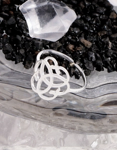 Macro shot of S925 hallmark on the hollow Celtic knot silver ring inner band