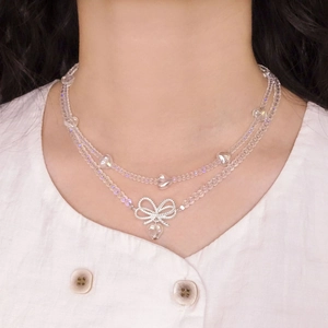S925 silver double-layered necklace featuring crystal heart beads and a bow pendant