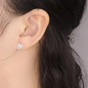 Elegant S925 sterling silver zircon stud earrings with irregular streamline design