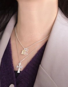 Detailed layered S925 silver necklace with yellow gemstone, key and cross pendants