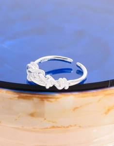 Detailed close-up showing the S925 hallmark on the silver twisted rope ring band