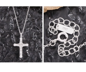 Detailed macro view of S925 sterling silver cross necklace with lobster clasp and S925 hallmark