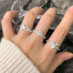 Three-piece S925 sterling silver knotted ring set with minimalist twist and bow design