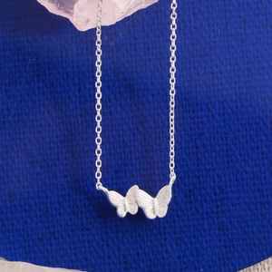 Elegant S925 sterling silver butterfly necklace with delicate double butterfly pendant detail