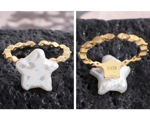 Détail du poinçon S925 sur la bague en argent doré avec perle en forme d'étoile