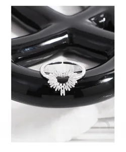 Close-up of S925 sterling silver heart ring featuring a radial sunburst design