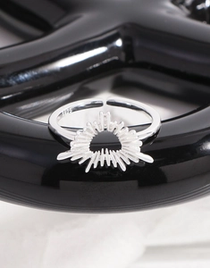 Macro shot of S925 sterling silver ring detail with inner stamp and sunburst texture