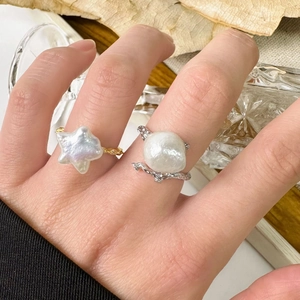 Baroque pearl ring set with lava texture and branch design in gold and silver finish