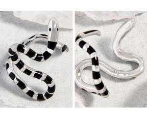 Detail view of S925 sterling silver stamp on the inner band of snake-shaped ring