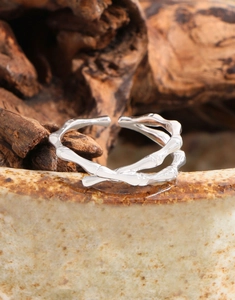 Macro shot of S925 sterling silver ring showing double-layer bamboo texture details