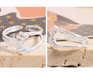 Vue détaillée de la bague multicouche entrelacée en argent S925 avec poinçon officiel