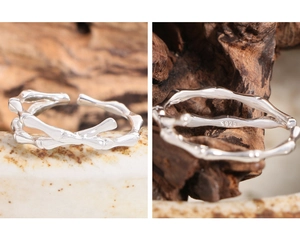 Macro detail of S925 sterling silver ring showing bamboo texture and hallmark