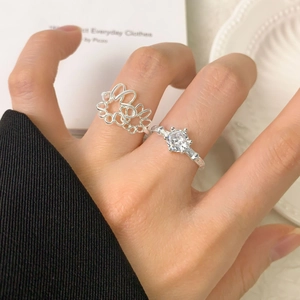 S925 sterling silver hollow flower ring and classic six-prong zircon ring set for women