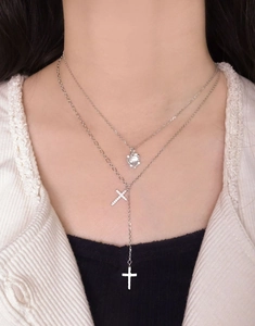 Detail of S925 silver double-layer necklace with heart and zircon cross pendants