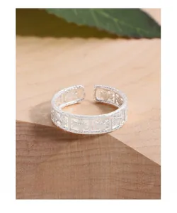 Detailed view of S925 sterling silver open ring with hollow square texture on wood