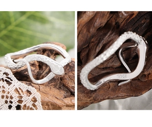 Macro view of S925 sterling silver snake ring showing detailed scales and inside hallmark