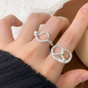 S925 sterling silver ring set featuring snake texture and pretzel knot designs