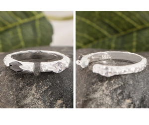 Macro detail of S925 silver ring featuring rock texture and bicolor zircon stones