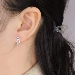 Boucles d'oreilles en argent S925 avec zircon violet et design moderne de lave fluide