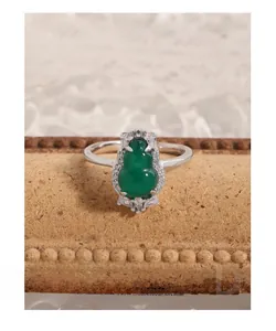 Macro shot of S925 silver ring featuring green chalcedony gourd and sparkling zircon stones