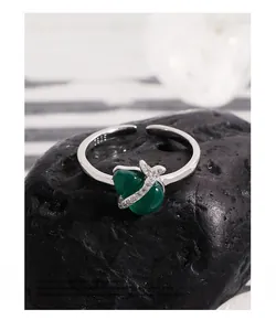Detail showing green chalcedony gourd on S925 silver ring with small white stones