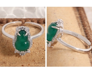 Macro detail of S925 sterling silver stamp and green chalcedony gourd ring band