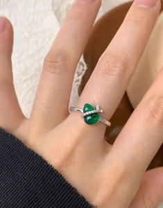 Close-up of S925 silver ring featuring green chalcedony gourd and micro-set diamonds