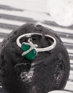 Macro shot of S925 sterling silver ring featuring heart-shaped green chalcedony and zircons