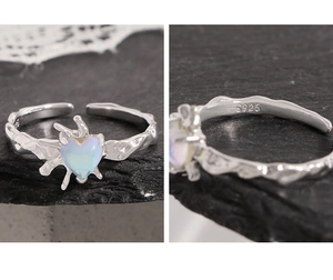 Close-up of S925 sterling silver hallmark on lava texture heart moonstone ring