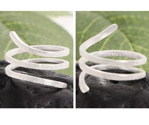 Close-up of S925 sterling silver stamp on texture snake style wrap open ring