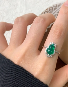 Macro shot of S925 silver ring featuring green chalcedony gourd and sparkling zircons