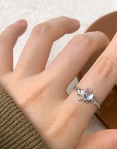 Detailed view of S925 sterling silver lava texture ring with heart moonstone