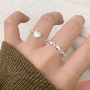 S925 sterling silver heart ring set with twisted rope and wave bands on a hand