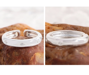 Detail of S925 sterling silver stamp and star engraving on adjustable ring band