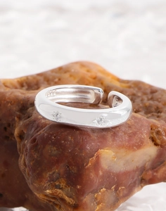 Detail view of S925 sterling silver ring showing the star engraving and zircon inlay