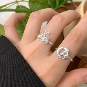 S925 sterling silver bow cherry ring set for women with polished finish on model hand