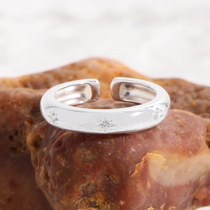 Adjustable S925 sterling silver ring with engraved star patterns and zircon stones