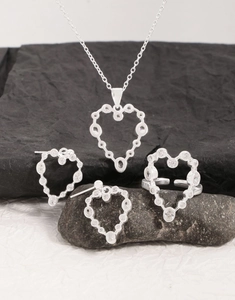 Exquisite S925 sterling silver heart-shaped jewelry set with necklace, earrings, and ring