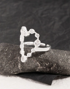 Macro view of S925 sterling silver ring showing the inner S925 hallmark and zircon heart