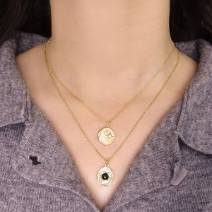Double-layered S925 silver necklace with golden sun pendant and black agate stone
