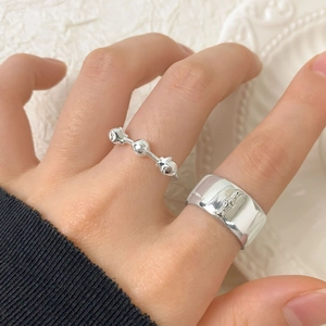 S925 sterling silver bow wide band ring and star ring set worn on finger