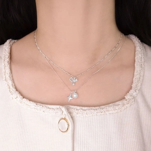S925 sterling silver layered star and pearl necklace featuring elegant bow pendant
