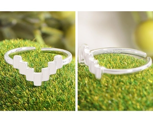 Macro shot of S925 sterling silver stamp on adjustable geometric irregular V-shape ring