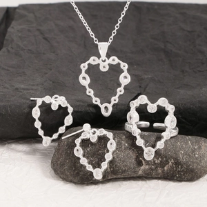 Elegant S925 silver jewelry set featuring heart pendant necklace earrings and open ring
