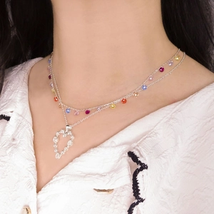Double-layered S925 silver necklace featuring colorful beads and a hollow heart zircon pendant