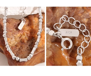 Detail of S925 sterling silver beaded bracelet showing hallmark and spring clasp