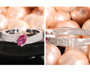 Detail view of adjustable S925 silver ring with pink zircon and S925 hallmark stamp