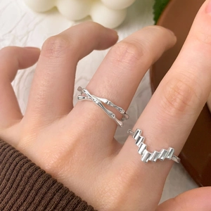 S925 sterling silver rings with bamboo and geometric V-shape designs in a stacked look