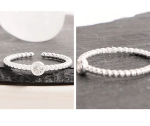 Detailed view of S925 sterling silver beaded ring with zircon and S925 hallmark